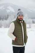 Black White Gray Pom-Pom Beanie on Male Model in Snow