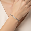 Crystal tennis bracelet on model's wrist
