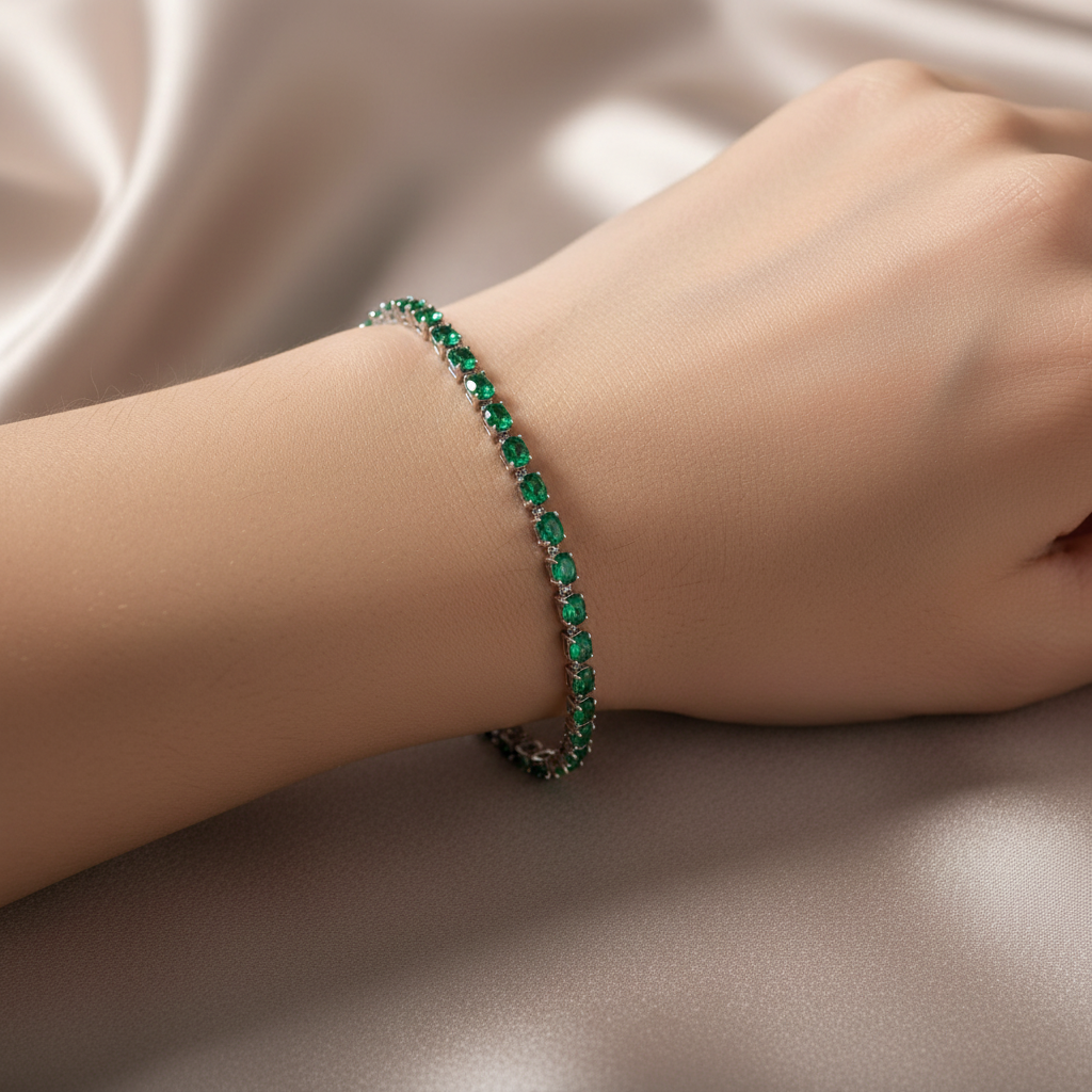Emerald green crystal bracelet on model's wrist