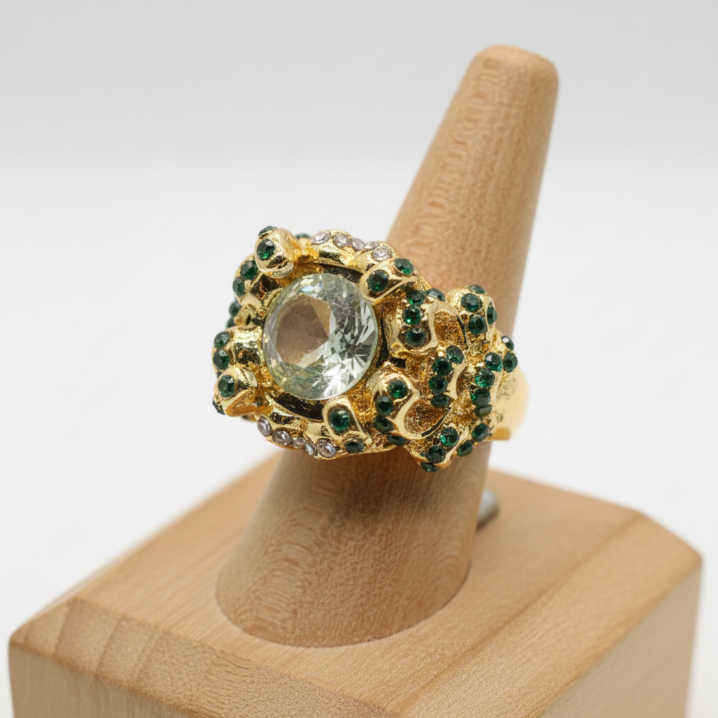 Ring on wooden display stand, white background