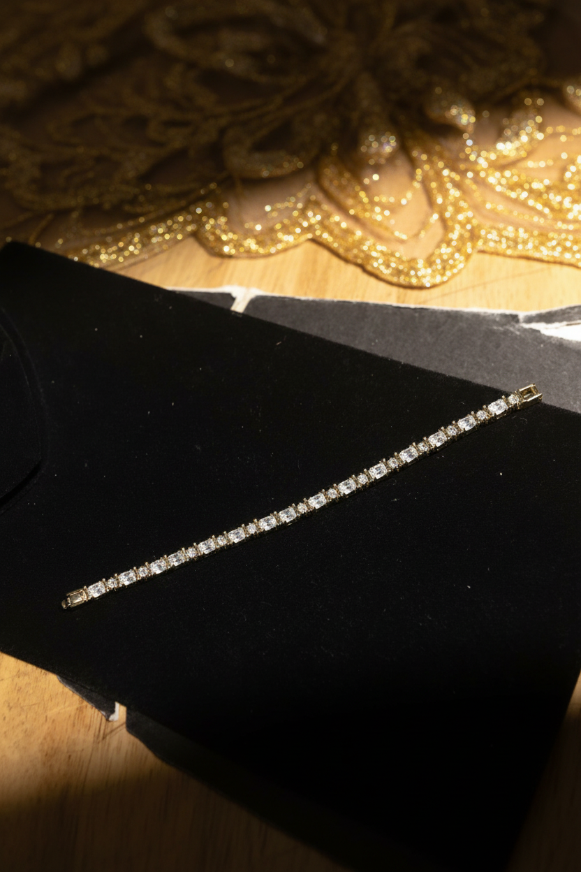 7.5 inch large crystal 14K gold plated tennis bracelet on luxurious dark velvet background