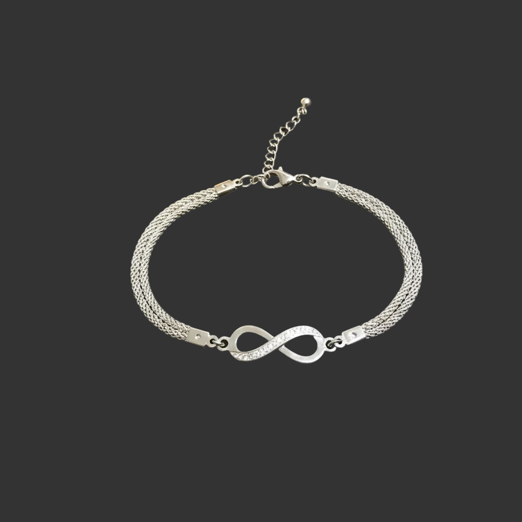 Silver infinity bracelet luxury flat lay