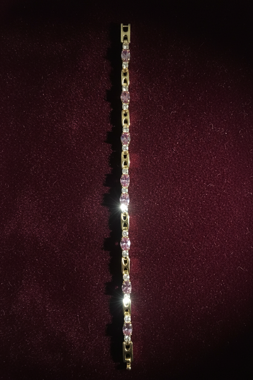 Pink lavender crystal bracelet on burgundy velvet lay flat