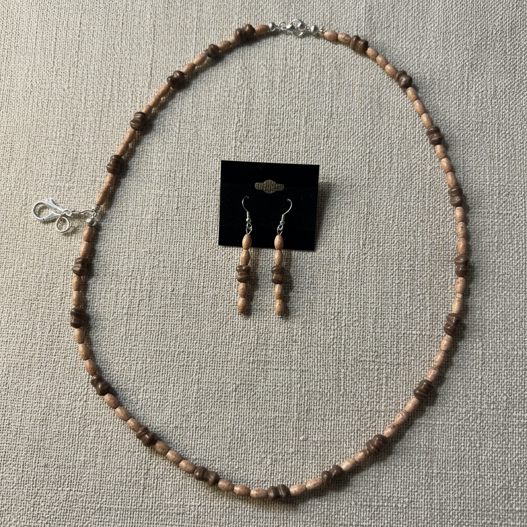 Elongated jasper and peanut jasper necklace and earring set on warm linen