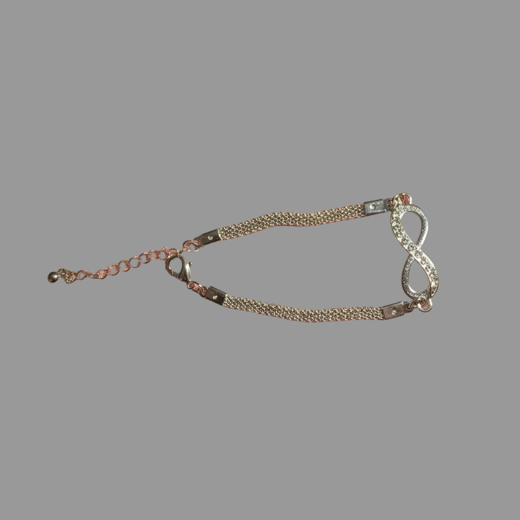 Infinity bracelet crystal detail on blush pink velvet