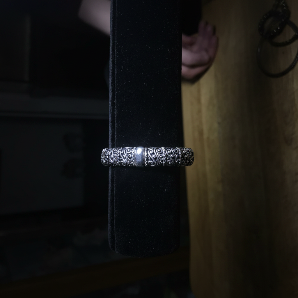 Intricate Silver Bracelet on Display