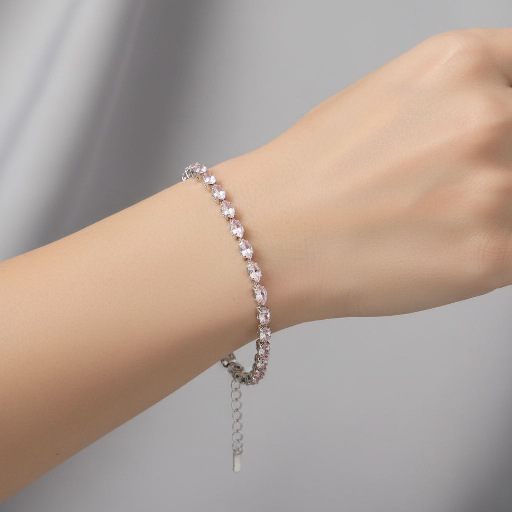 Light pink marquise crystal bracelet on model's wrist