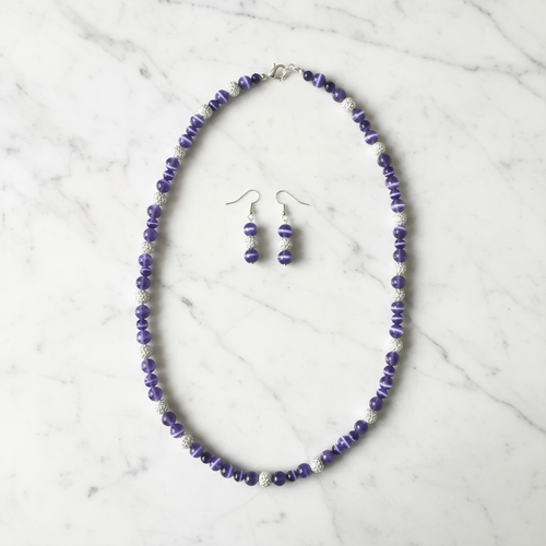 Purple Cat's Eye Necklace - Marble Flat Lay
